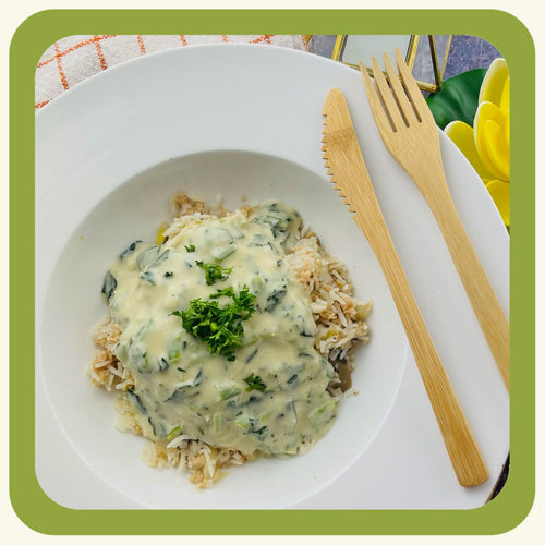 BASMATI RICE WITH PROTEIN, CREAMY WHITE WINE SAUCE, SPINACH AND GARLIC CONFIT